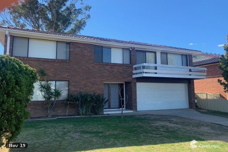 24 Groundsel Ave, Macquarie Fields, NSW 2564