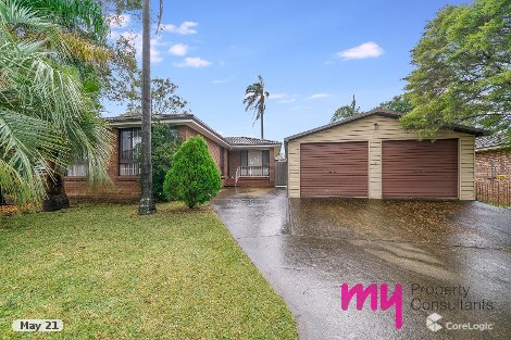 12 Groundsel Ave, Macquarie Fields, NSW 2564